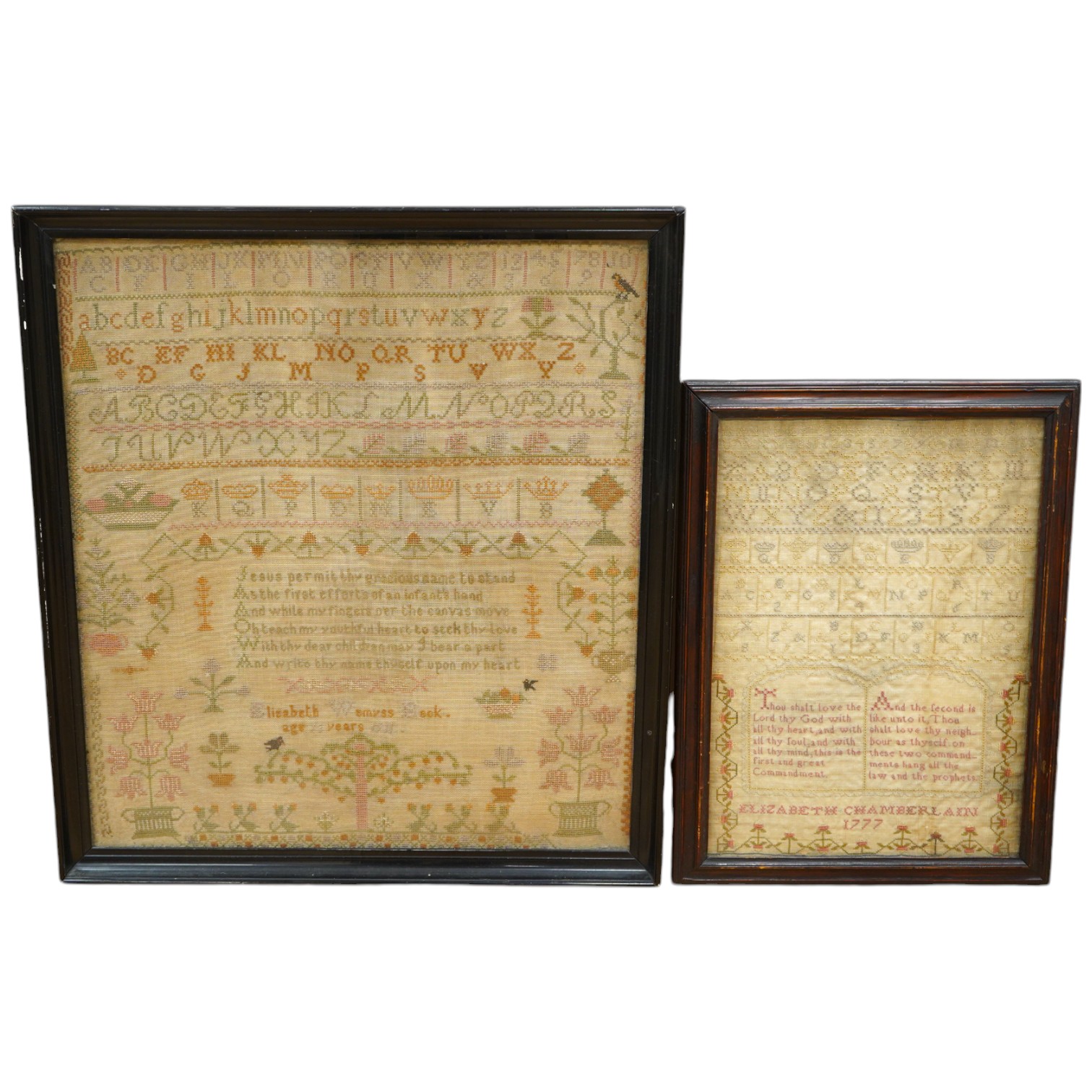 Two samplers; one late 18th century, the other early 20th century, the 18th century sampler by Elizabeth Chamberlain dated 1777, worked with an alphabet and framed verse bordered with vineous flowers, the later sampler b